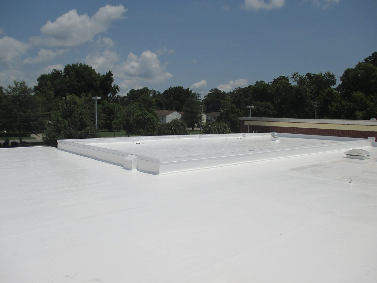 Marlin Coatings bright white reflective surface reducing roof heat gain in sunlight