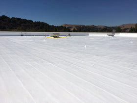 Marlin Coatings sealing a roof seam demonstrating flexible, leak-resistant bond