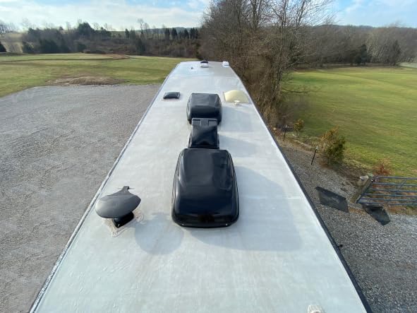 Marlin Coatings being sprayed on a commercial roof showing fast professional coverage