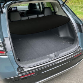Marretoo lifestyle shot with groceries hidden showing improved trunk tidiness