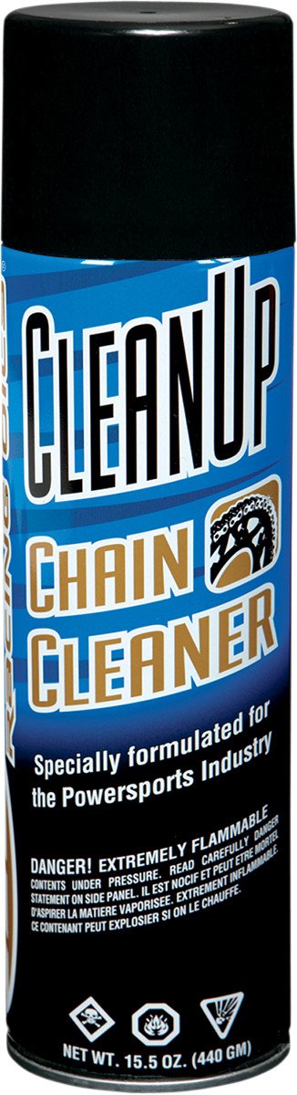 Maxima spray in use on motorcycle chain, dissolving grime for easier cleaning