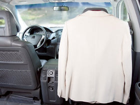 MAXSA wide shoulder holding a suit jacket to prevent creases and maintain shape
