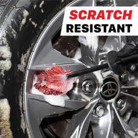 Maxshine brush cleaning wheel spokes in use, removes brake dust effectively
