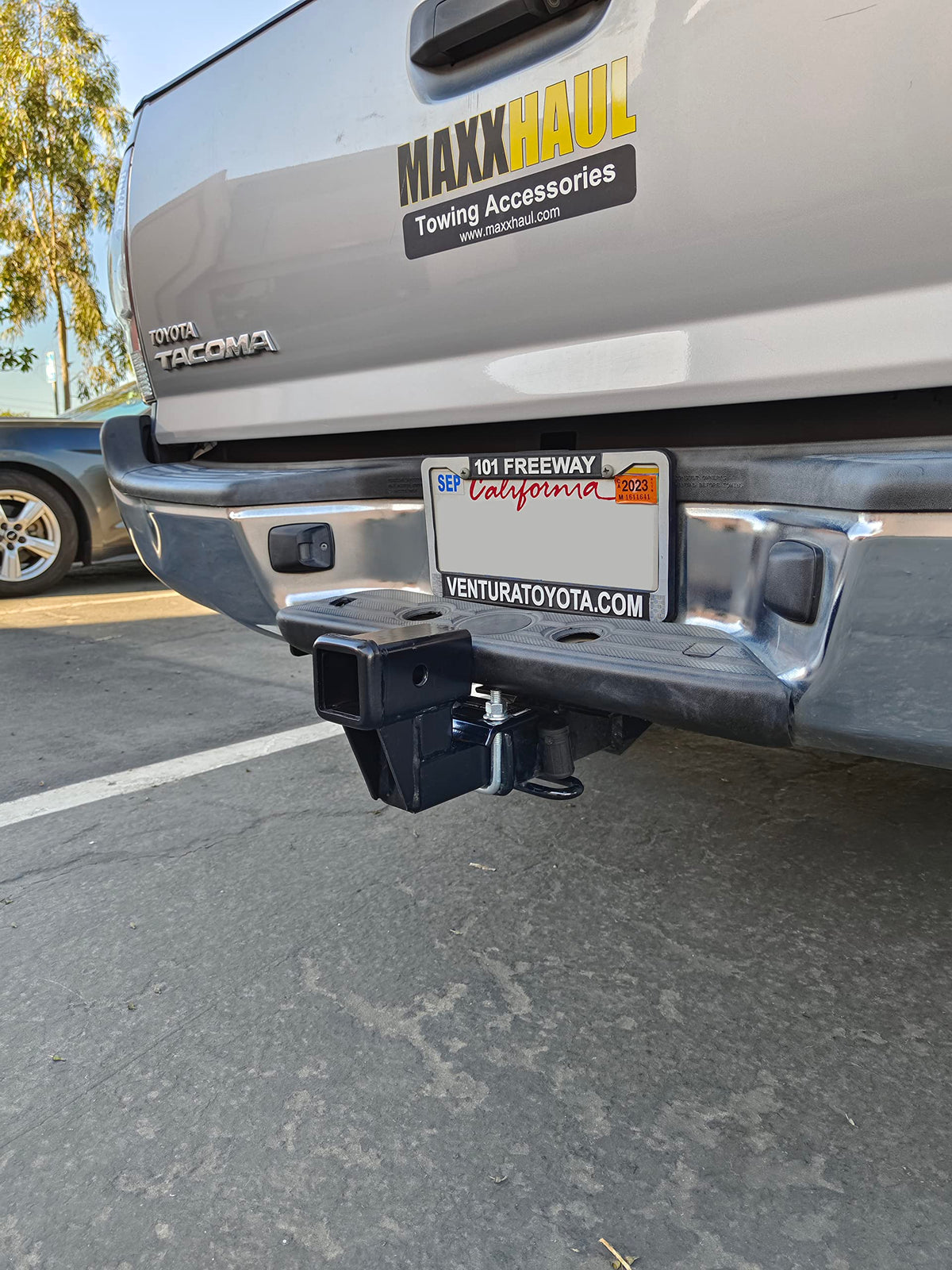 MAXXHAUL riser with cargo carrier illustrating secure accessory mounting