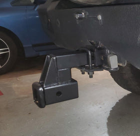 MAXXHAUL riser installed with bike rack demonstrating improved clearance