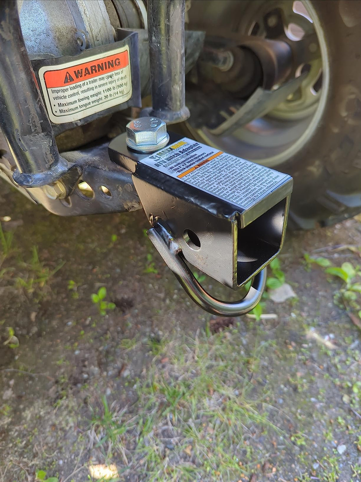 MAXXHAUL lifestyle shot towing gear on a trail for dependable use