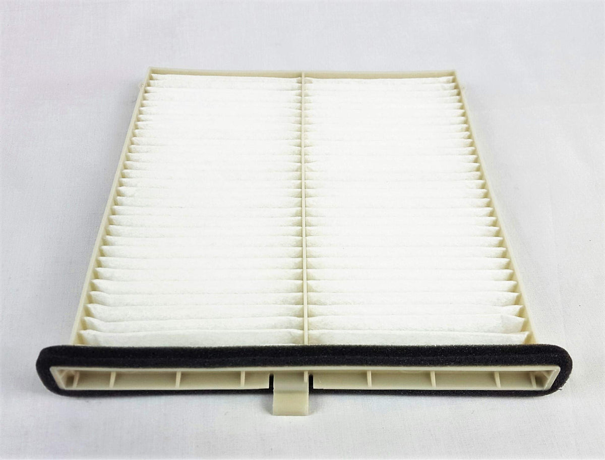 Mazda cabin filter pleat close-up displaying media texture and dust capture benefit