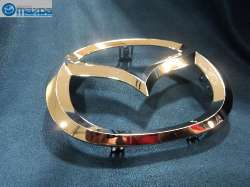 Mazda emblem packaging and part number C235-51-731A confirming authentic replacement