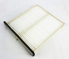 Mazda cabin filter installed in glovebox area demonstrating easy replacement and improved airflow
