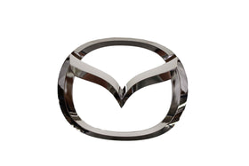 Mazda front emblem full view showing precise factory finish and brand restoration