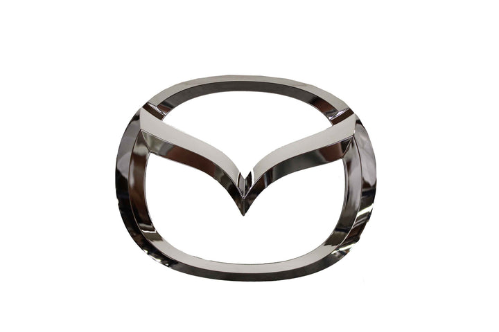 Mazda front emblem full view showing precise factory finish and brand restoration