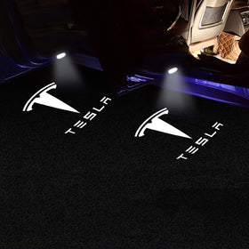 Meagkka installed on a Tesla door with lights activating to improve nighttime entry safety