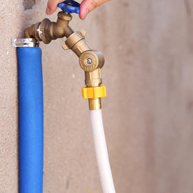MEASUREMAN lifestyle campsite setup with hose providing safe fresh water on site