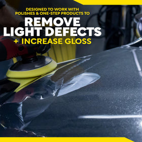 Meguiar's pad held in hand for scale showing 6-inch size and easy panel coverage