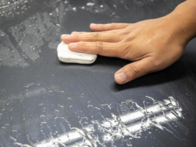 Meguiar's before and after paint surface comparison showing contaminant removal benefit