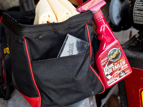 Meguiar's open case displaying clay bars, detailer, and towel organized