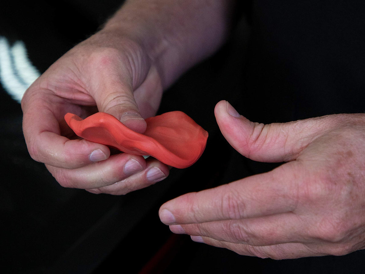 Meguiar's clay in use on car panel demonstrating smooth finish and improved surface feel