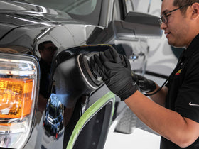 Meguiar's finished car panel reflecting light to show deep gloss benefit