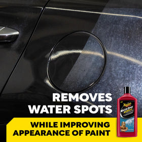 Meguiar's foam applicator applying remover for targeted spot correction