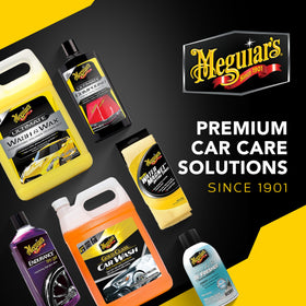 Meguiar's owner washing car in driveway demonstrating easy at-home detailing