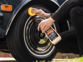 Meguiar's 16 oz bottle in hand for scale showing convenient travel-friendly size