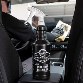 Meguiar's product being wiped on dashboard showing safe quick cleaning benefit