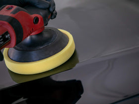 Meguiar's lifestyle shot of show car with reflective finish showcasing improved shine