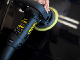 Meguiar's before and after car panel showing reduced swirls and deeper gloss