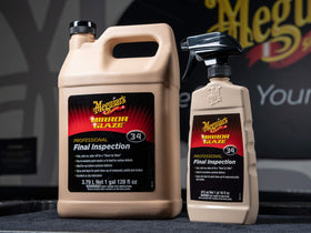 Meguiar's M34 being used as clay bar lubricant on vehicle paint, provides smooth glide