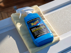 Meguiar's visible before and after water spot removal on hull surface