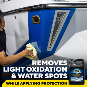 Meguiar's pouring cleaner-wax into applicator demonstrating easy dosing