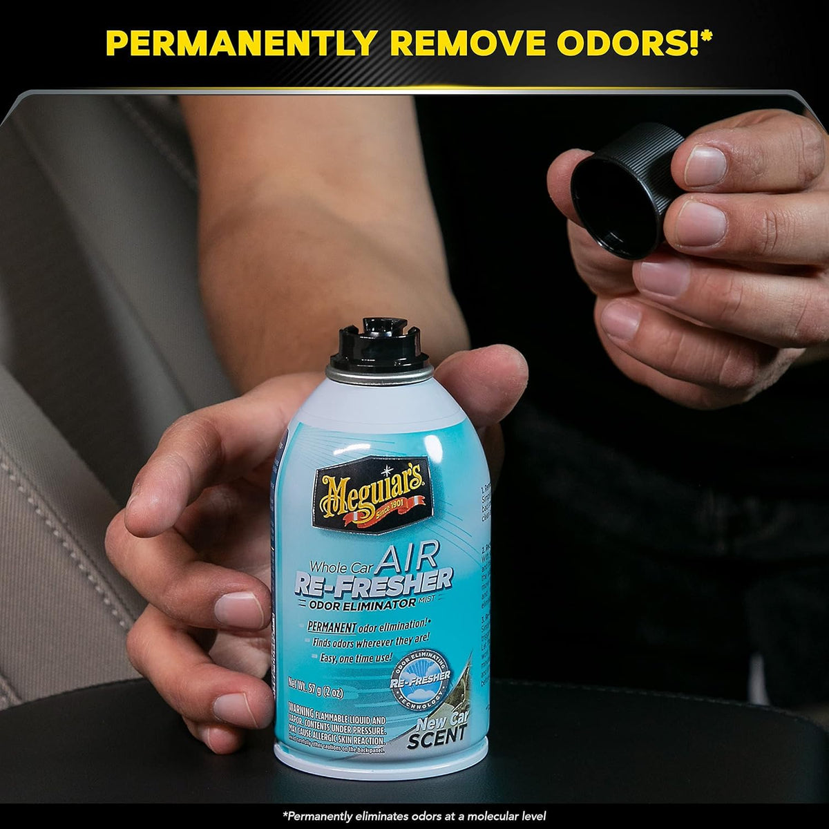 Meguiar's mister in use inside car circulates odor neutralizer