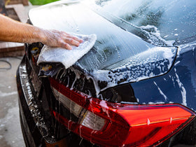 Meguiar's water sheeting off paint after rinse, speeding drying and minimizing water spots