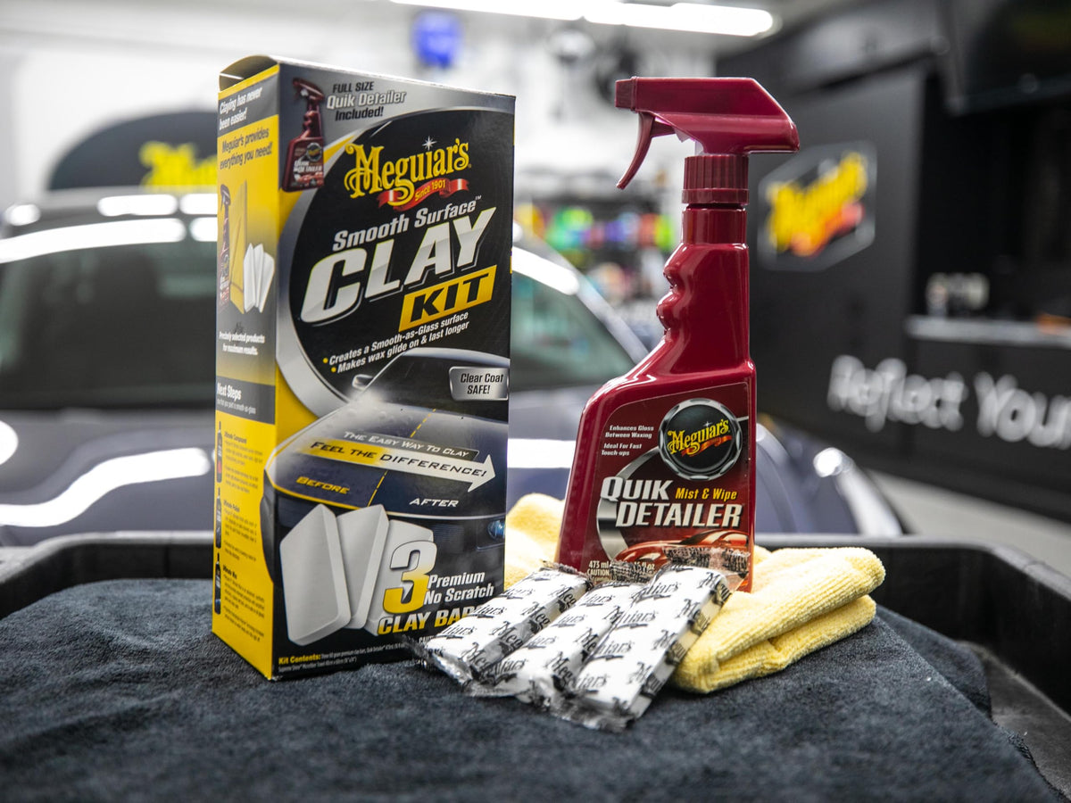 Meguiar's Quik Detailer spray bottle detail demonstrating lubrication for scratch-free claying