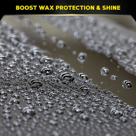 Meguiar's pouring action into bucket illustrating easy dilution