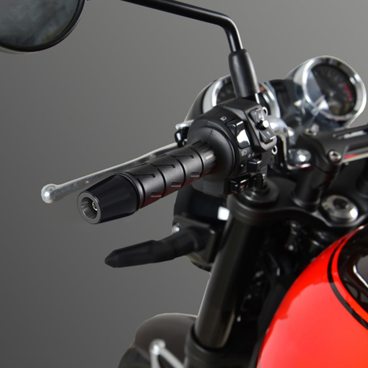 MFGZD bar end protecting a handlebar after a light fall showing damage prevention benefit