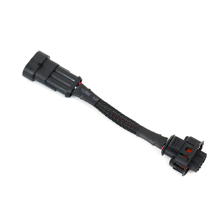 Michigan Motorsports adapter front connector showing plug design and secure fit benefit