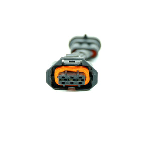 Michigan Motorsports adapter wiring and heat-resistant sleeving showing durability benefit