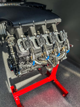 Michigan Motorsports installed in engine bay, demonstrating tidy routing and improved appearance under hood.