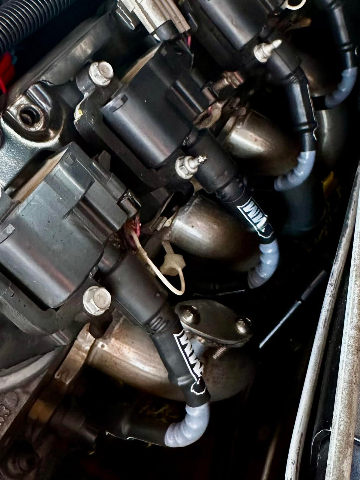 Michigan Motorsports wires laid out for length comparison showing correct fitment