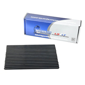 Michigan Motorsports pushrods next to ruler showing accurate 7.400 inch length