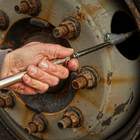 Milton S-986 being used on a semi truck tire highlighting professional, fast pressure checks