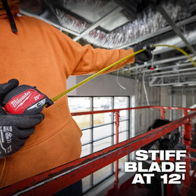 Milwaukee tape measure on jobsite measuring steel stud for fast layouts