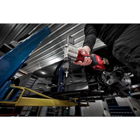 Milwaukee M12 2550-20 on jobsite bench with tools illustrating real-world trade use and portability