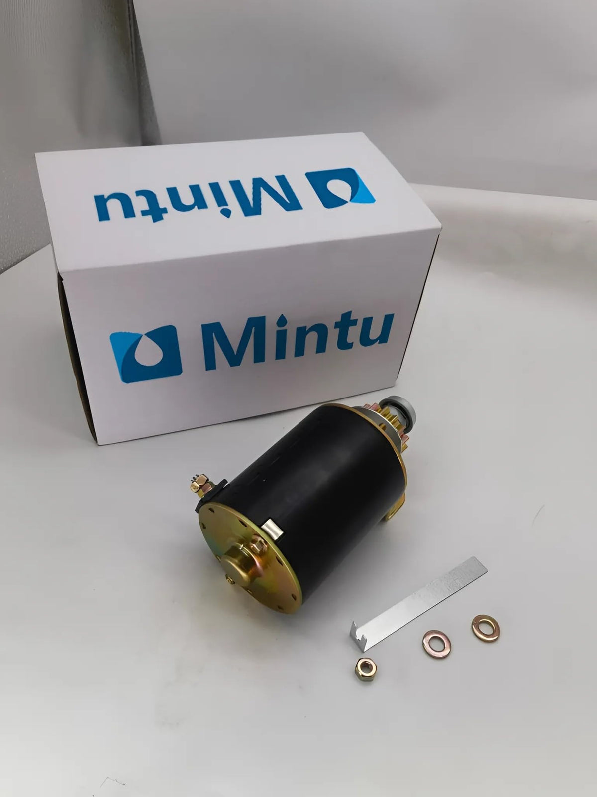 Mintu starter beside ruler showing 3.8 inch housing measurement for size verification benefit