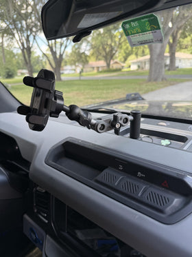 MIRISPO holding phone in landscape for navigation and hands-free directions