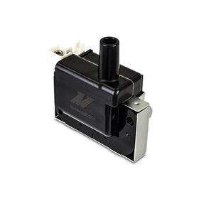 Mishimoto ignition coil installed on Honda engine demonstrating direct-fit reliability