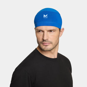 MISSION liner worn under bike helmet showing cool comfort during rides