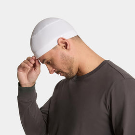 MISSION helmet liner worn by runner outdoors providing cooling and sun protection