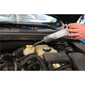 Mityvac extracting brake fluid from a master cylinder for precise bleeding
